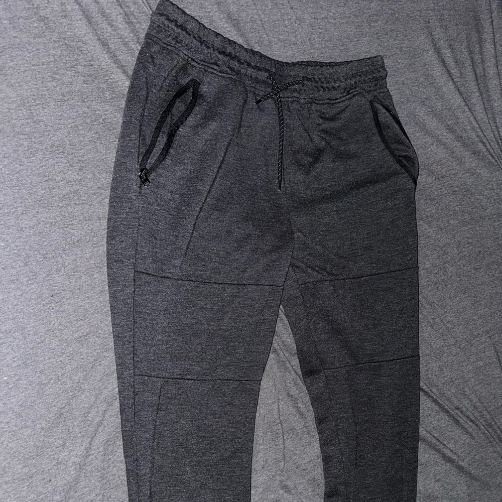 Dark gray, men’s size large, sweatpants, zippers, hole in the left pants pocket